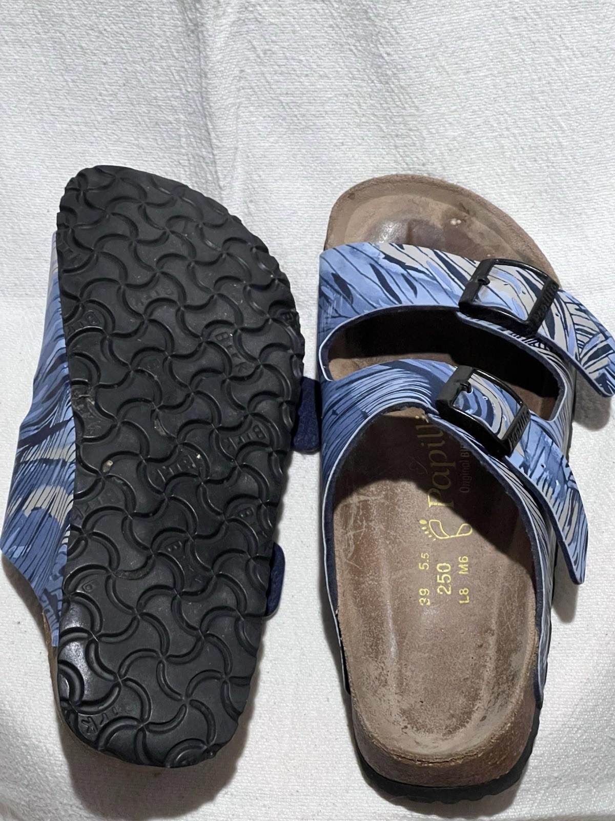 Birkenstock “Papillio” – blue and tan streak design with black buckles