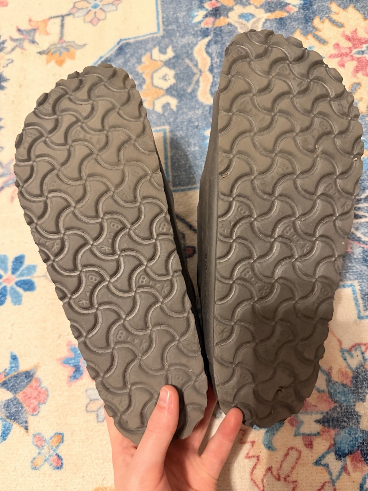 sandals are the Birkenstock Arizona EVA model in metallic anthracite or black